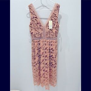 Sleeveless dress by The Clothing Company. Size L.